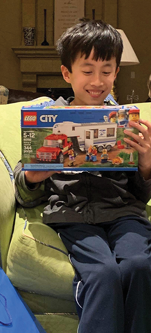 Timothy excitedly receives legos