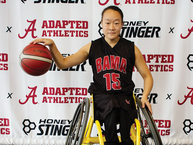 woman participating in wheelchair basketball