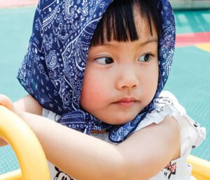 young Chinese girl with spina bifida